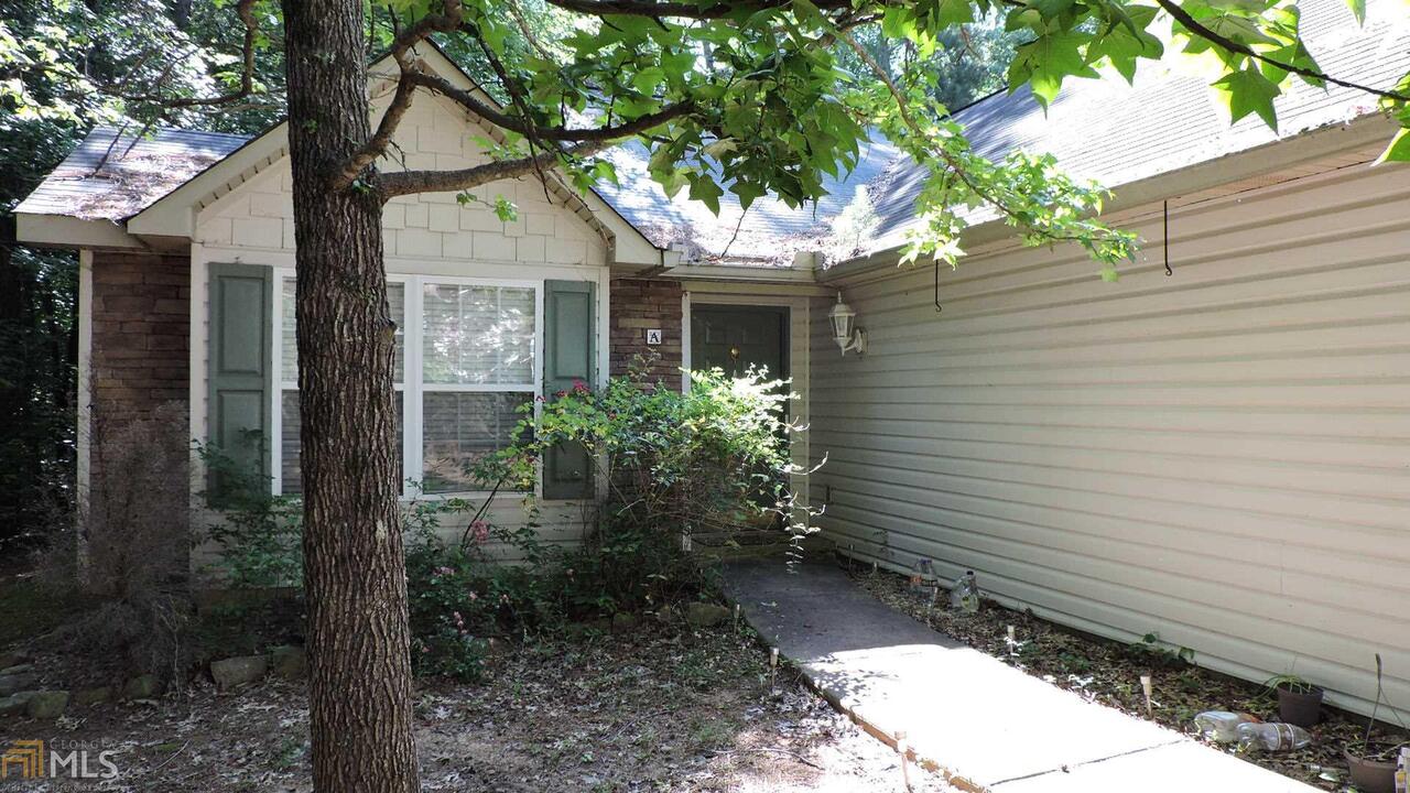 341 Leafmore Road Southwest, Unit A Rome, GA 30165 - Photo 1 of 1 a front view of a house with garden