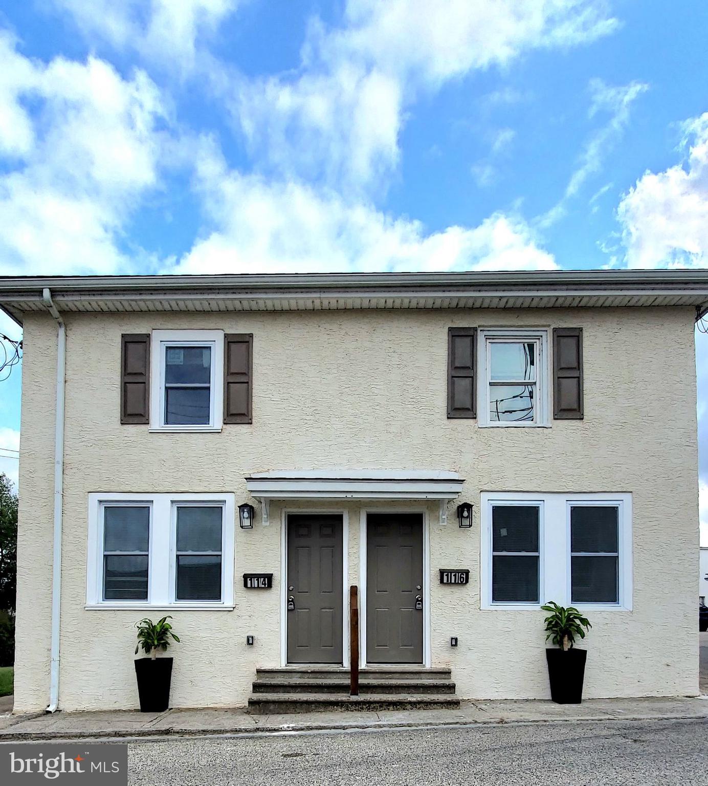 114 Center Street Bridgeport, PA 19405 - Photo 2 of 16 a front view of a house with yard