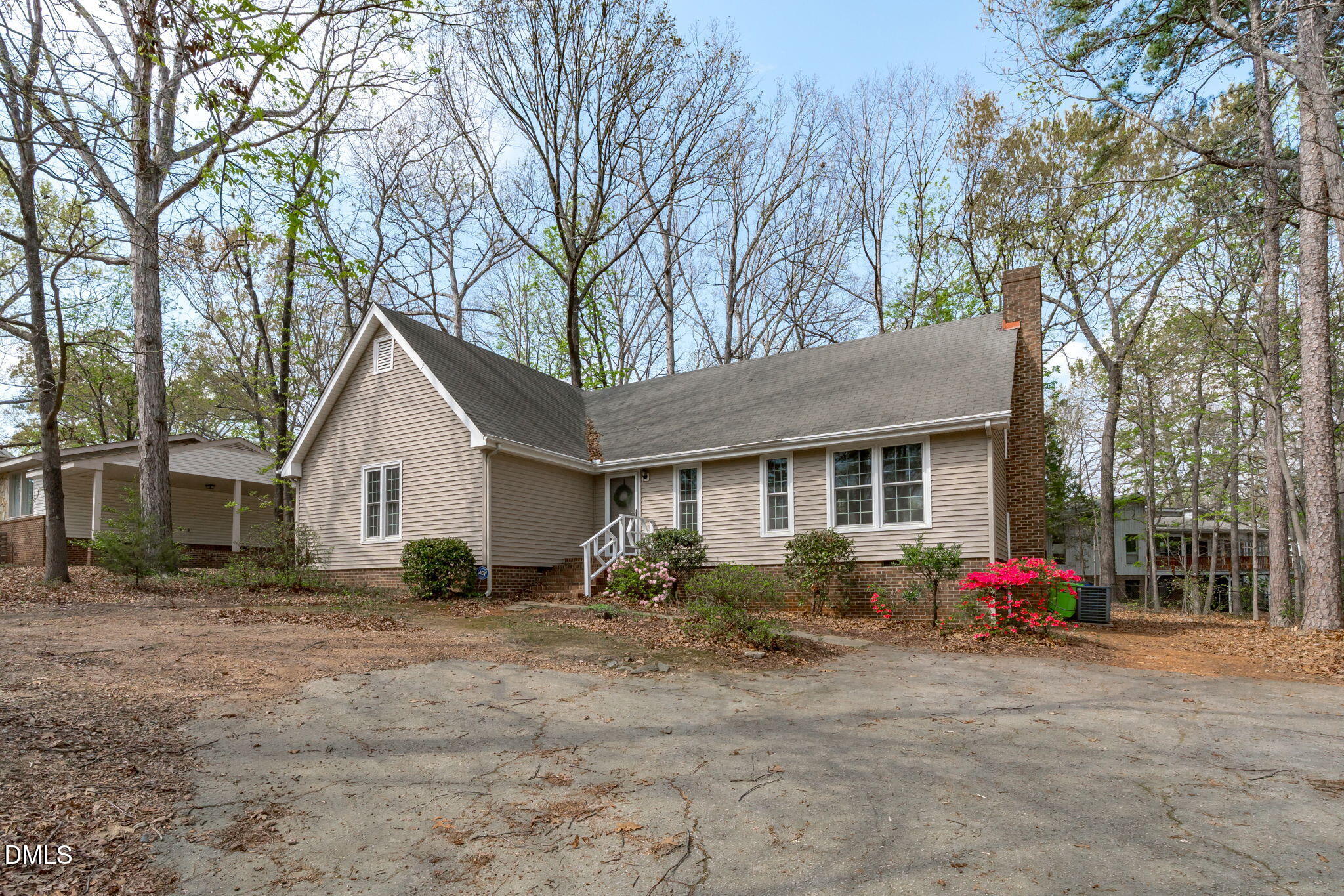 3304 Wade Avenue Raleigh, NC 27607 - Photo 37 of 38 a front view of house with yard and trees around