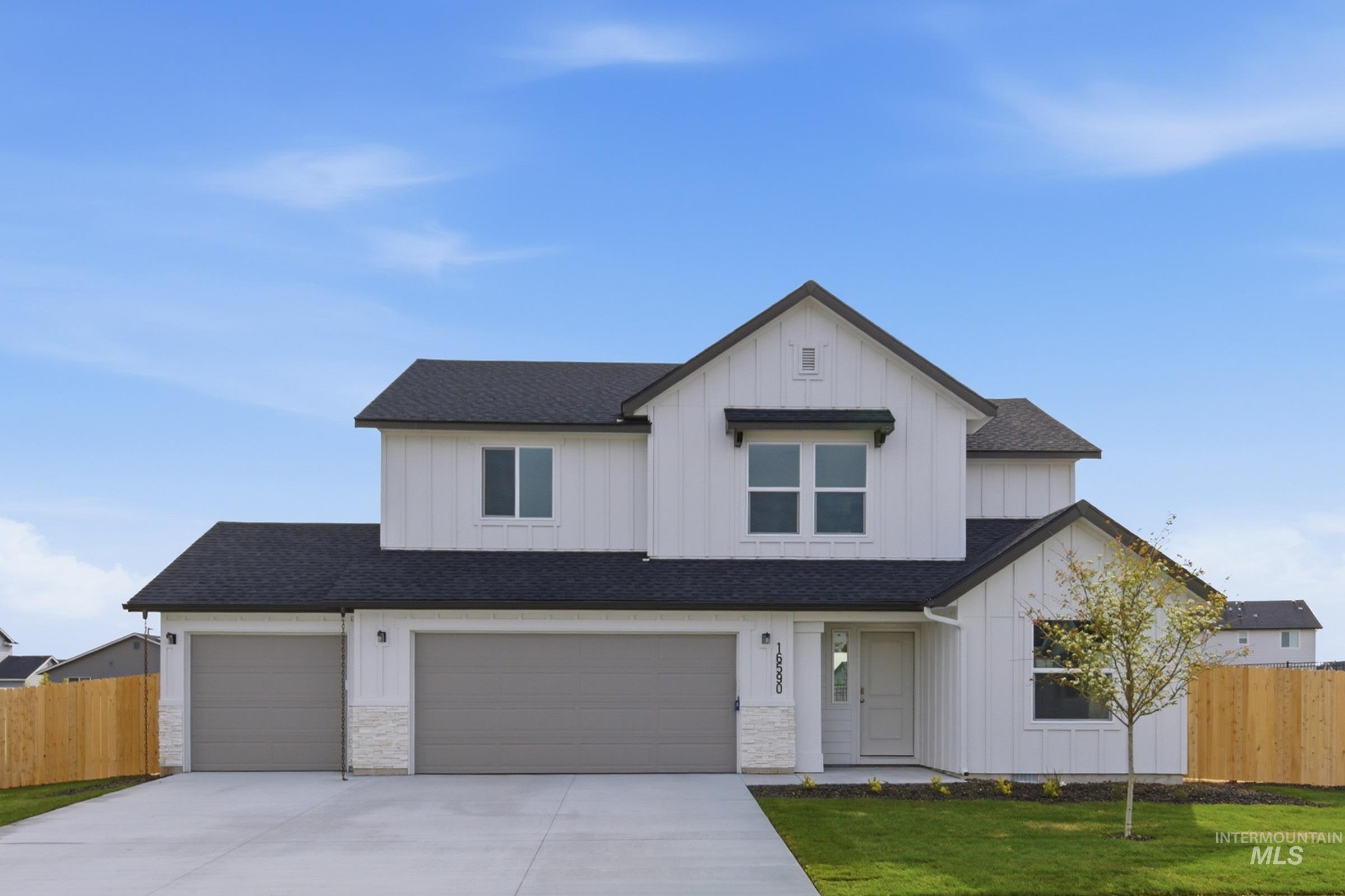 16590 Dunning Way Caldwell, ID 83607 - Photo 1 of 1 Contemporary two-story exterior with white board-and-batten siding