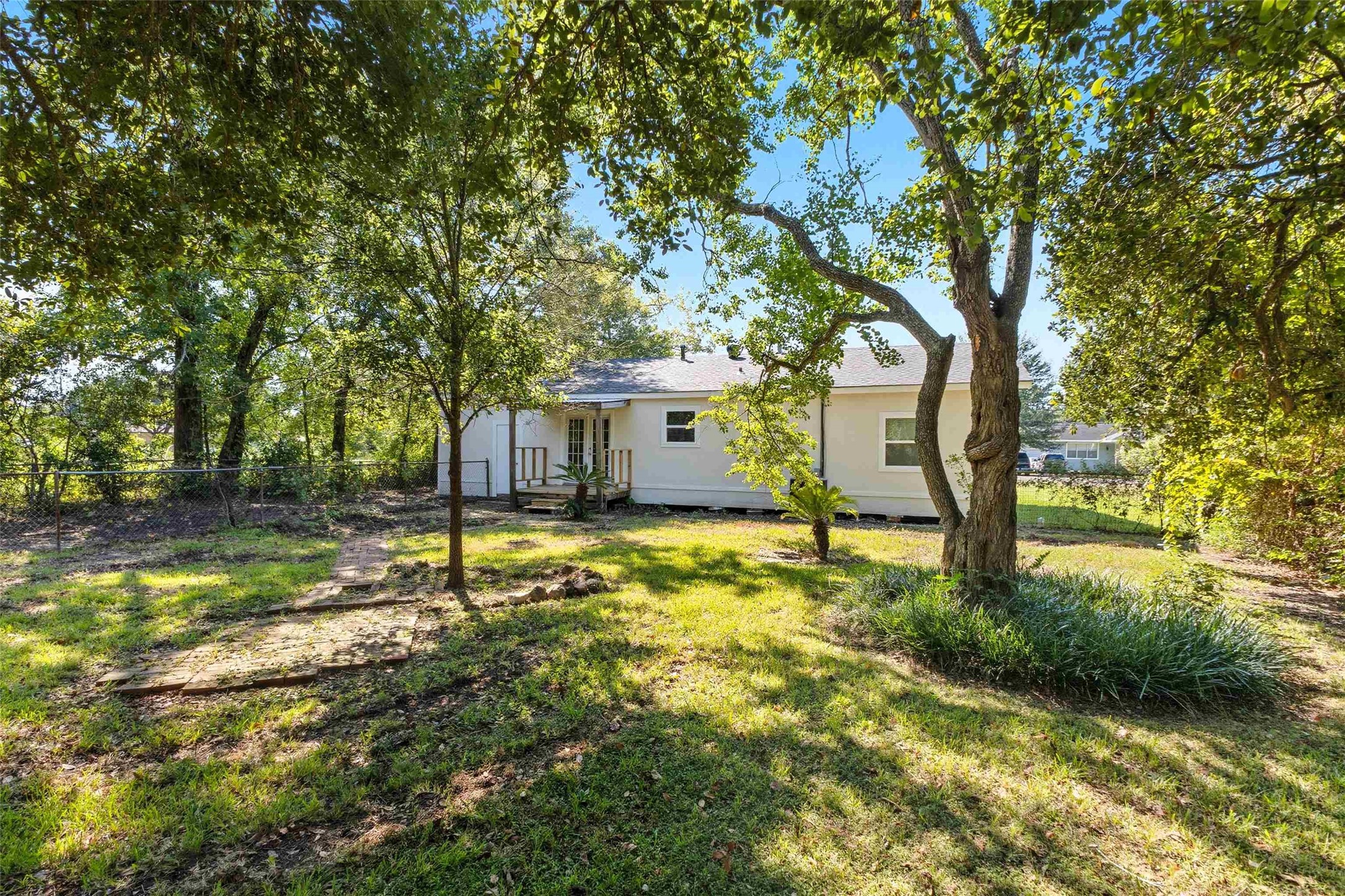 340 Warner Street Bridge City, TX 77611 - Photo 3 of 15 a house with swimming pool in front of it