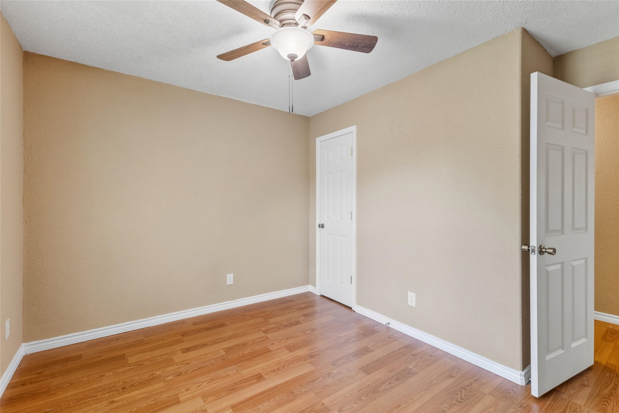 340 Warner Street Bridge City, TX 77611 - Photo 10 of 15 a view of an empty room with wooden floor