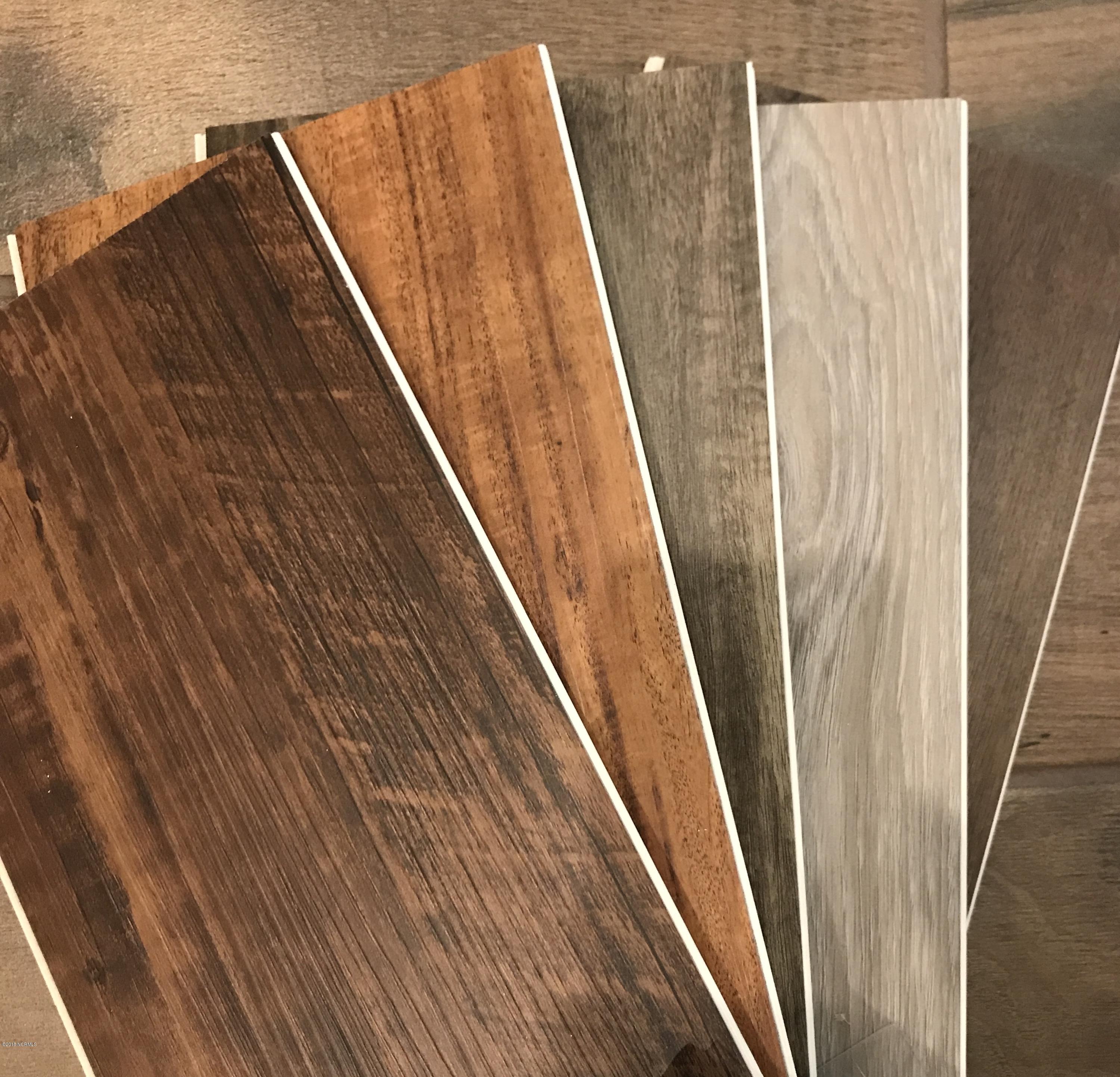 1468 Round Ridge Road Southeast Bolivia, NC 28422 - Photo 11 of 14 5 Harbor Plank WPC luxury vinyl - Tea party brown, Puritan Tan, Drifted Arcadia, Lighthouse grey, Nantucket