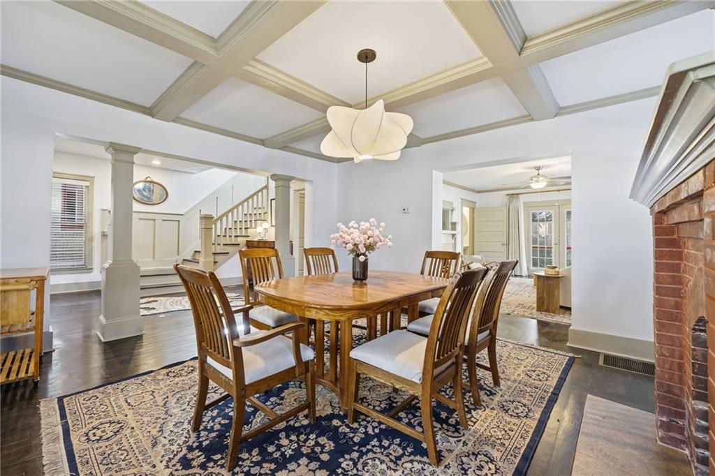 1530 South Gordon Street Southwest Atlanta, GA 30310 - Photo 12 of 46 a view of a dining room with furniture wooden floor and chandelier