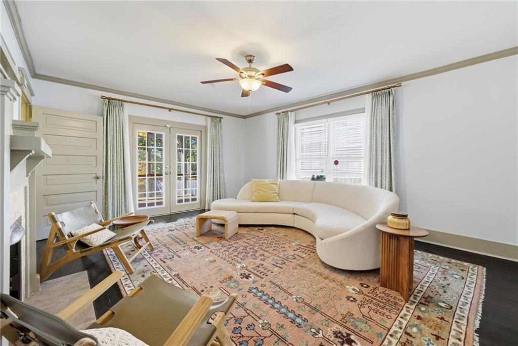 1530 South Gordon Street Southwest Atlanta, GA 30310 - Photo 14 of 46 a bedroom with a bed and wooden floor