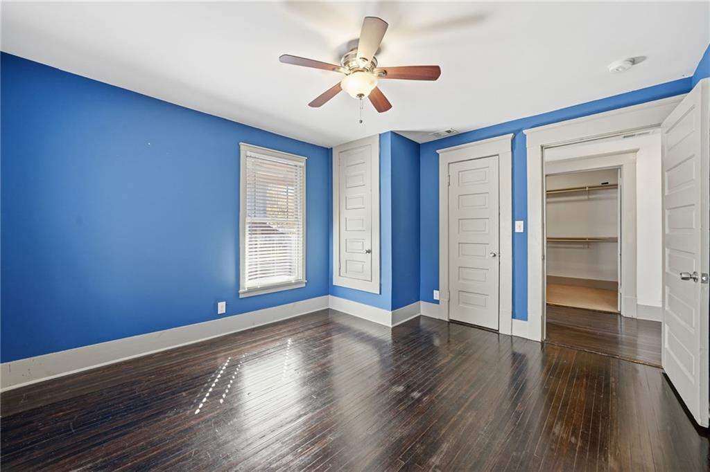 1530 South Gordon Street Southwest Atlanta, GA 30310 - Photo 35 of 46 a view of an empty room with a window and wooden floor