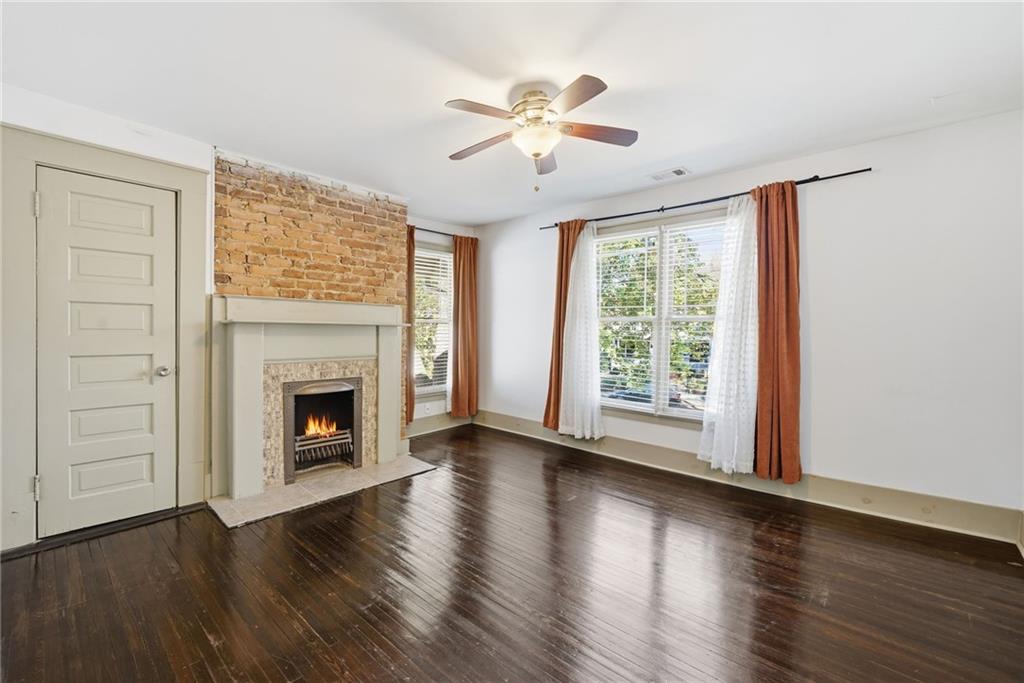 1530 South Gordon Street Southwest Atlanta, GA 30310 - Photo 37 of 46 a view of an empty room with wooden floor and a window