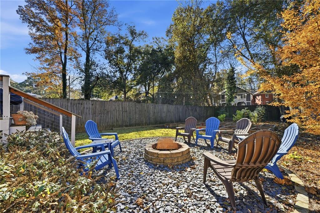 1530 South Gordon Street Southwest Atlanta, GA 30310 - Photo 43 of 46 a view of a chairs and table in the back yard of the house