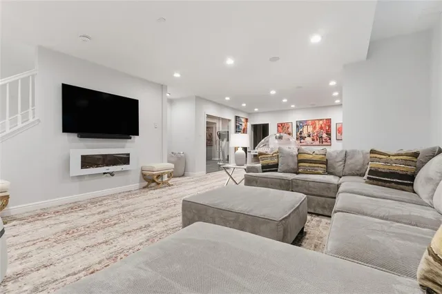 a kitchen with a sink and a stove top oven