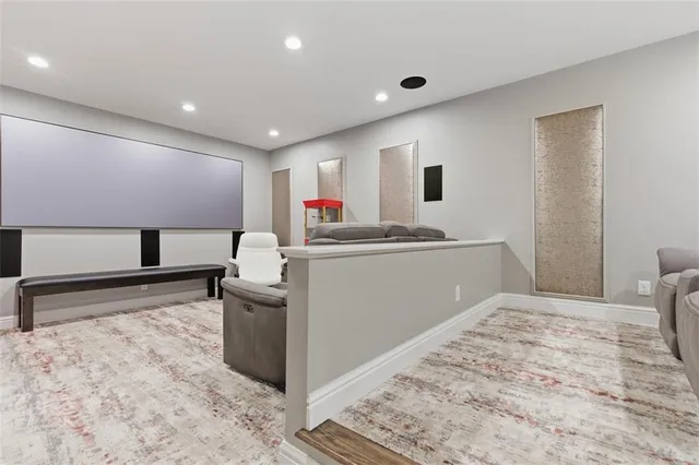 a view of gym room with gym equipment