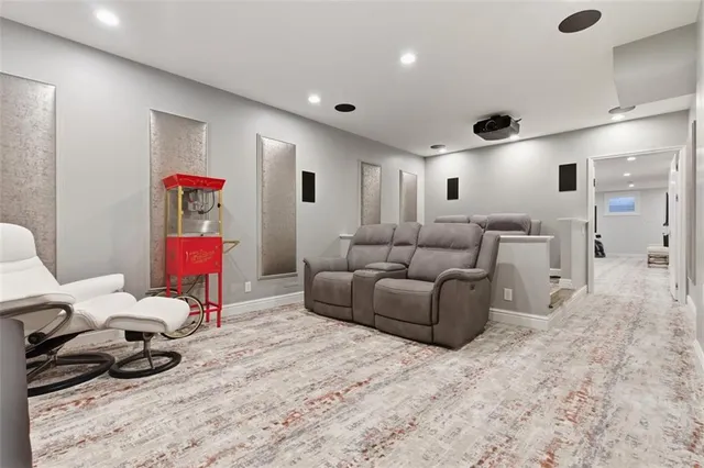 a view of a patio with table and chairs and potted plants