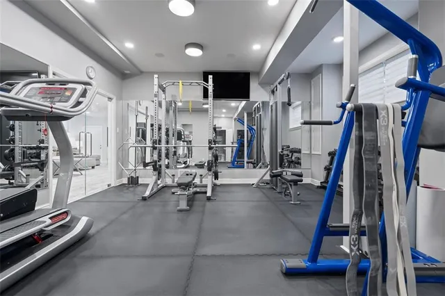 a view of backyard with outdoor seating and trees