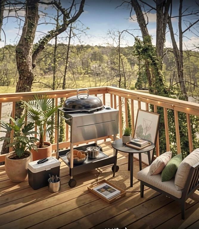 390 Colony Cove Alpharetta, GA 30022 - Photo 12 of 41 a view of balcony with wooden floor and outdoor seating
