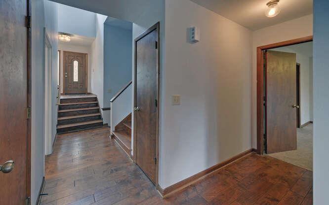 390 Colony Cove Alpharetta, GA 30022 - Photo 14 of 41 a view of a hallway with closet and stairs