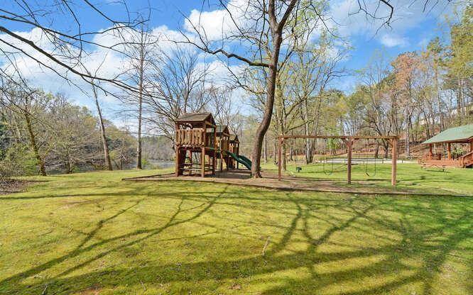 390 Colony Cove Alpharetta, GA 30022 - Photo 40 of 41 a view of a yard with swimming pool