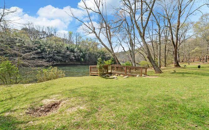 390 Colony Cove Alpharetta, GA 30022 - Photo 41 of 41 a view of a lake with houses