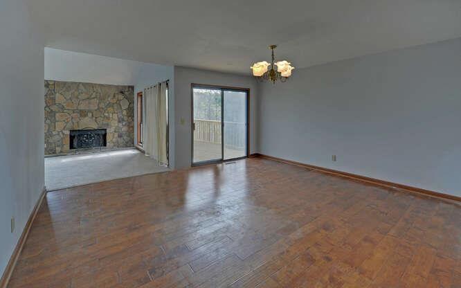 390 Colony Cove Alpharetta, GA 30022 - Photo 8 of 41 wooden floor in an empty room with a window