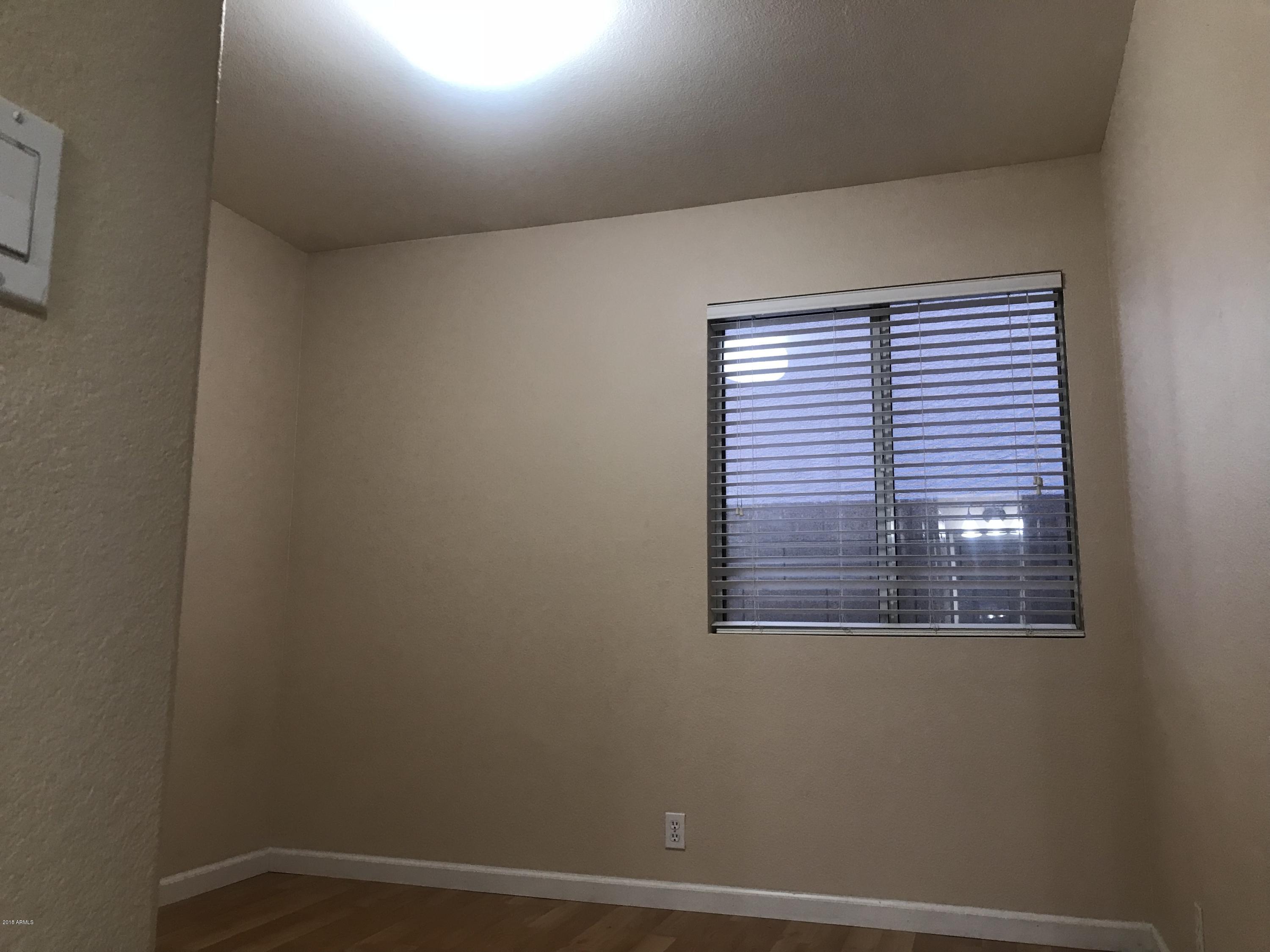 4133 West Bloomfield Road Phoenix, AZ 85029 - Photo 12 of 27 a view of a small space with a window