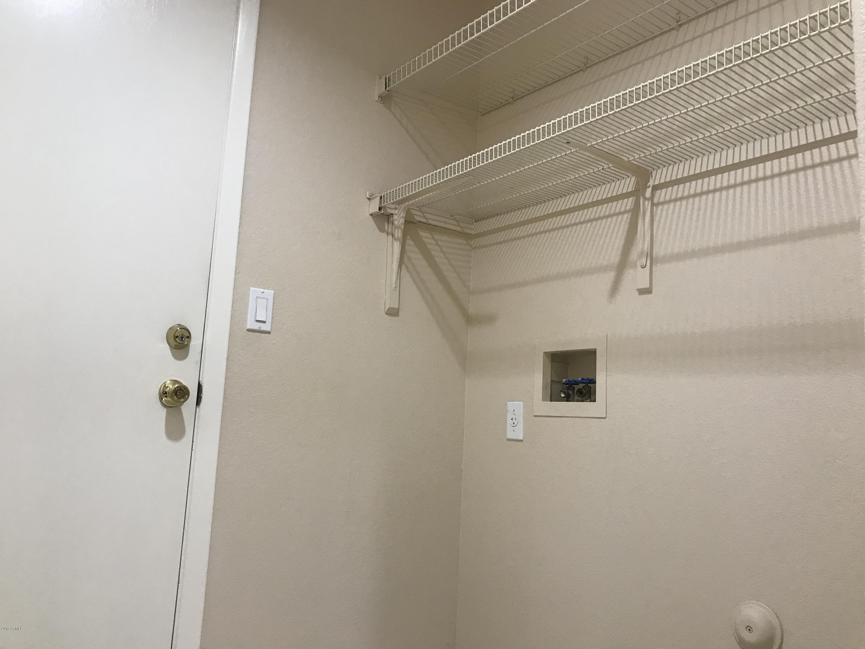 4133 West Bloomfield Road Phoenix, AZ 85029 - Photo 14 of 27 a bathroom with a shower and a sink