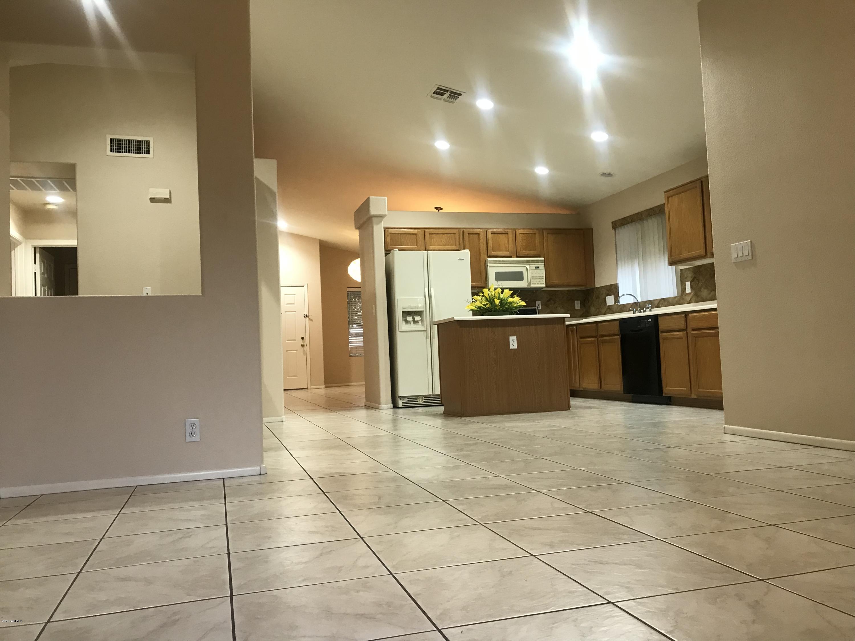 4133 West Bloomfield Road Phoenix, AZ 85029 - Photo 23 of 27 a view of a kitchen with a sink