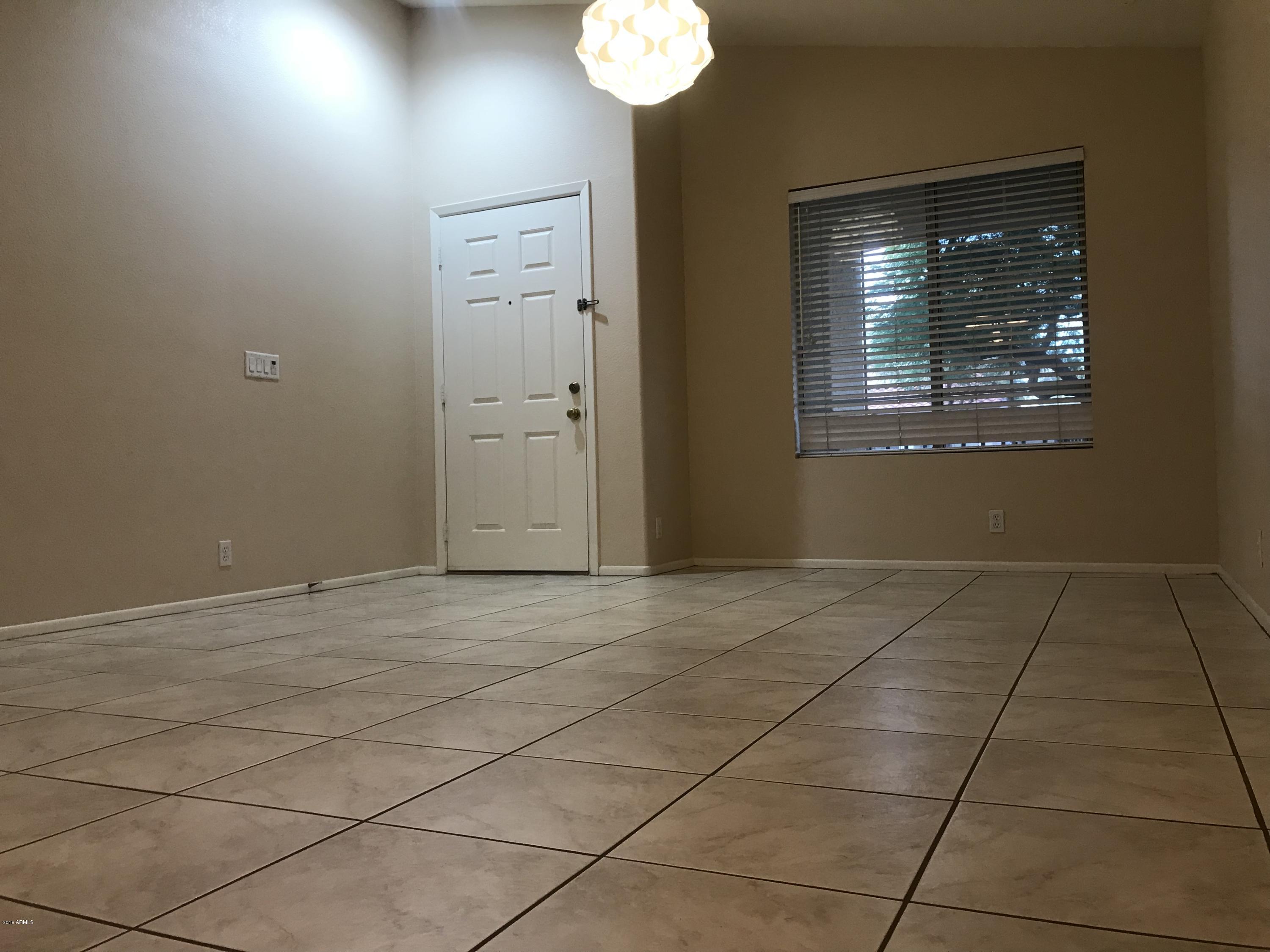 4133 West Bloomfield Road Phoenix, AZ 85029 - Photo 25 of 27 a view of an empty room with a window