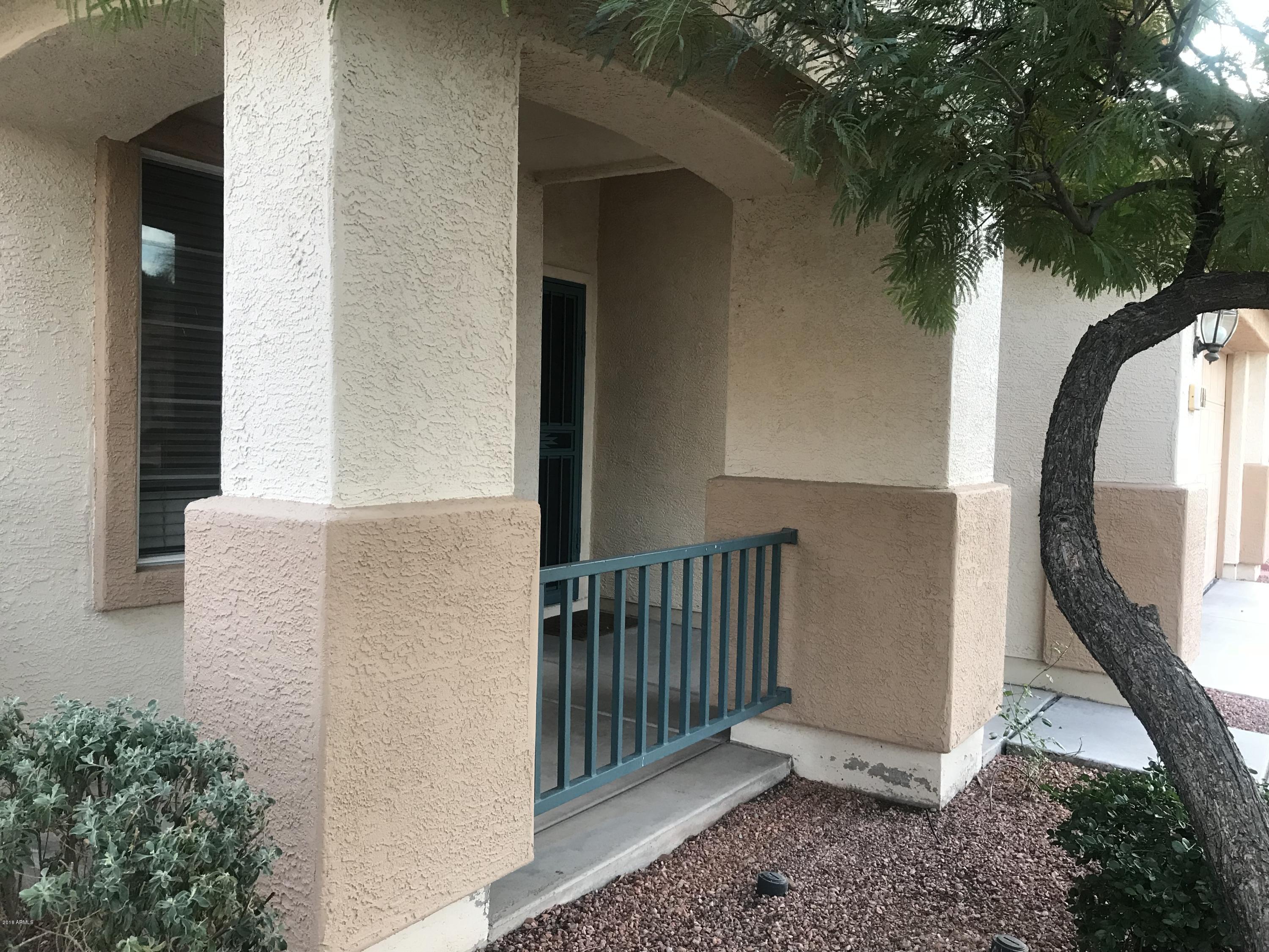 4133 West Bloomfield Road Phoenix, AZ 85029 - Photo 3 of 27 a view of a porch with a plants and trees