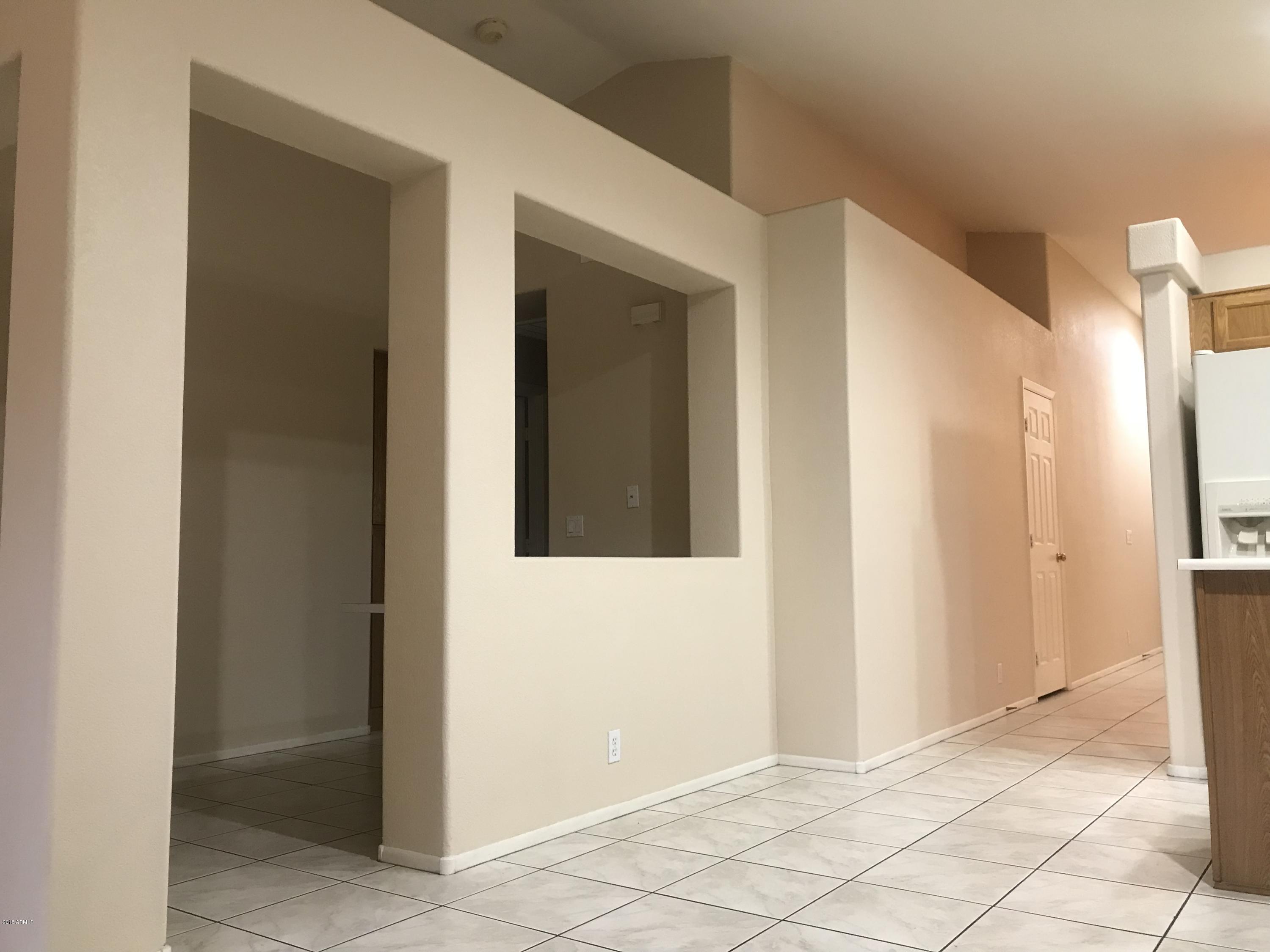 4133 West Bloomfield Road Phoenix, AZ 85029 - Photo 9 of 27 a view of a hallway