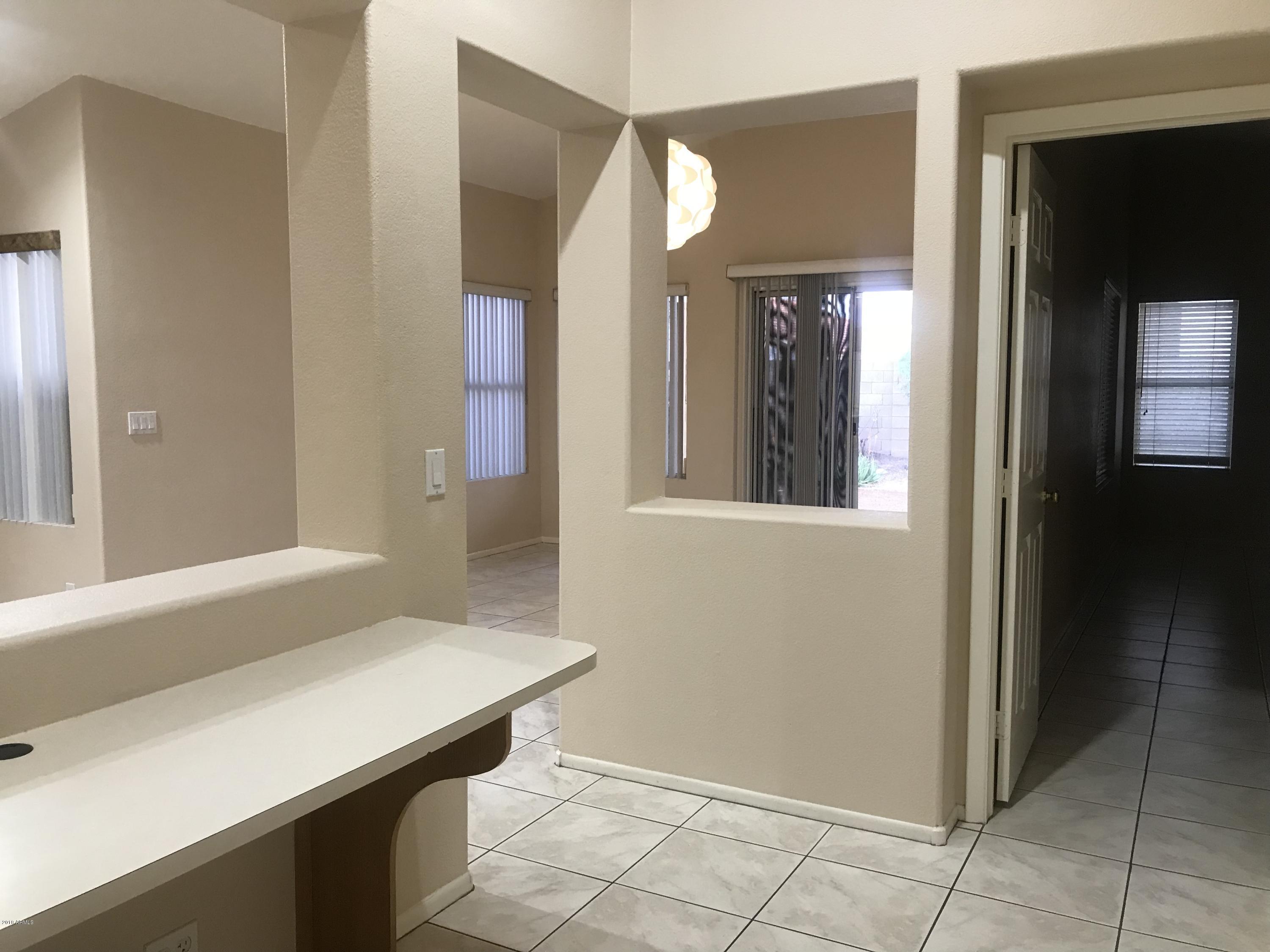 4133 West Bloomfield Road Phoenix, AZ 85029 - Photo 10 of 27 a view of livingroom with furniture and window