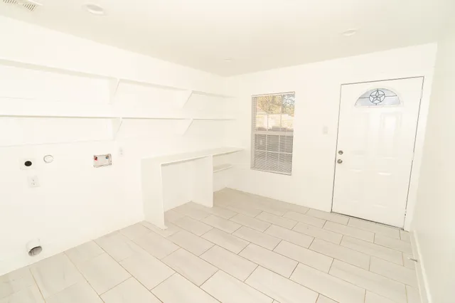 a bathroom with a sink a toilet and bathtub