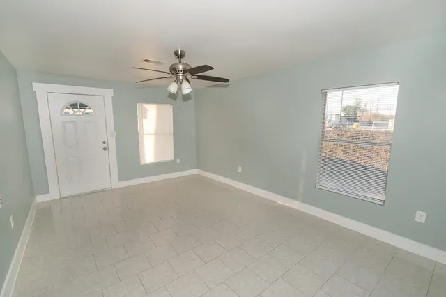 a bathroom with a sink a toilet and bathtub