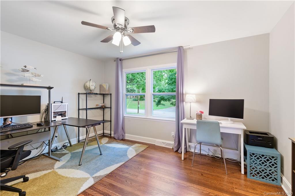 5600 Seacroft Road Charlotte, NC 28210 - Photo 14 of 18 a workspace with furniture hardwood and a window