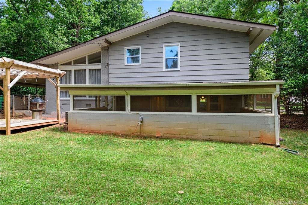 5600 Seacroft Road Charlotte, NC 28210 - Photo 16 of 18 a front view of a house with a yard