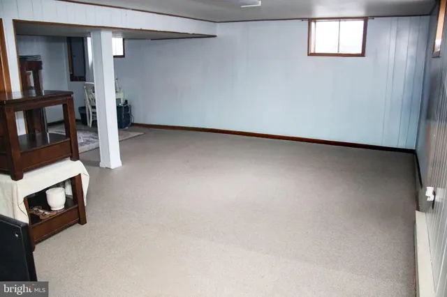 a view of dining room and wooden floor