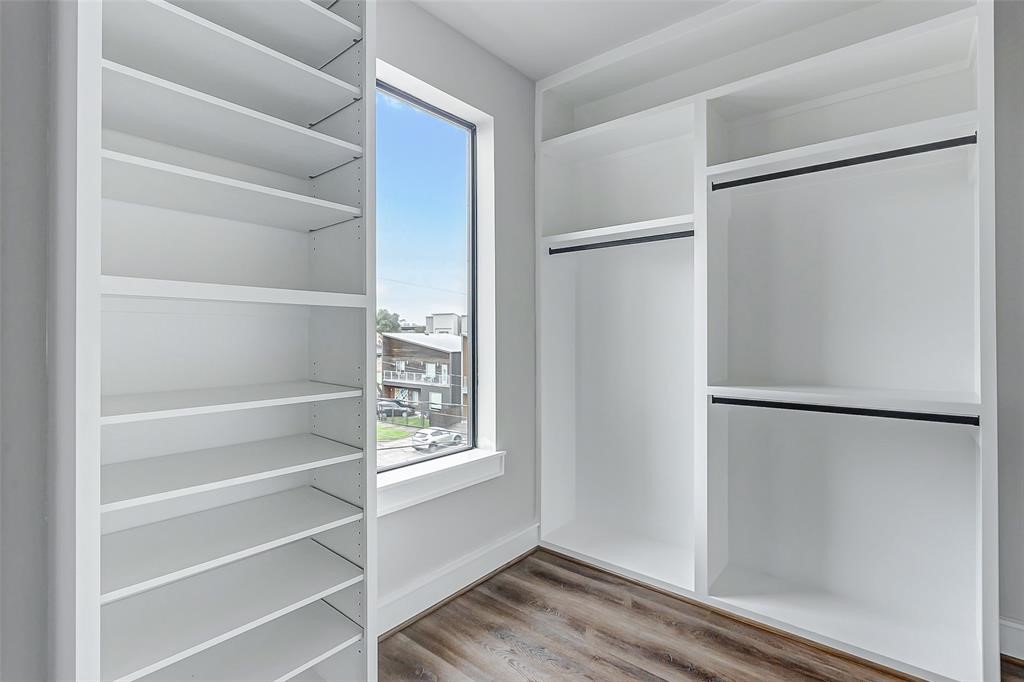 2106 Stuart Street Houston, TX 77004 - Photo 11 of 11 a view of walk in closet with empty racks