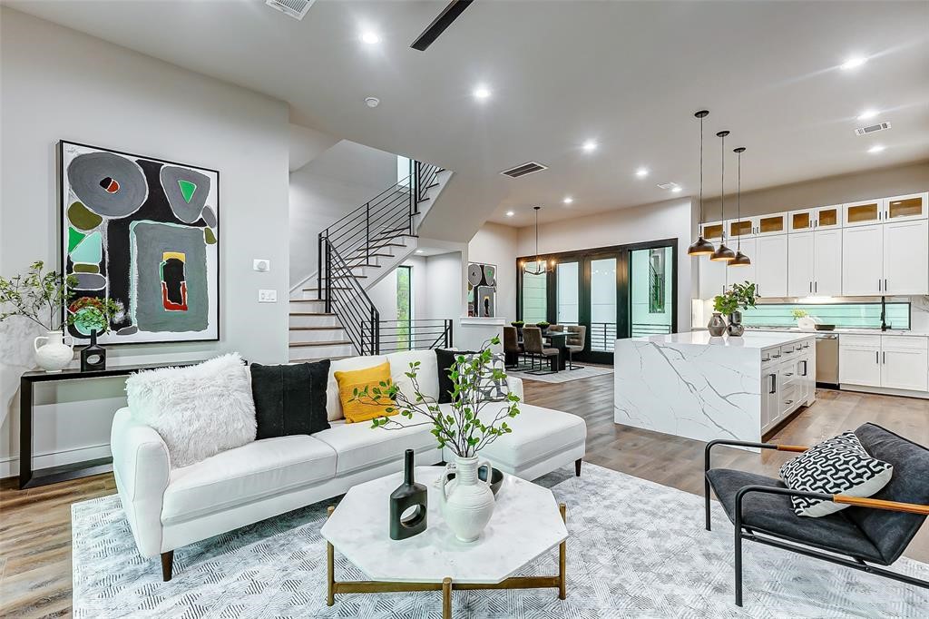 2106 Stuart Street Houston, TX 77004 - Photo 8 of 11 a living room with furniture and kitchen view
