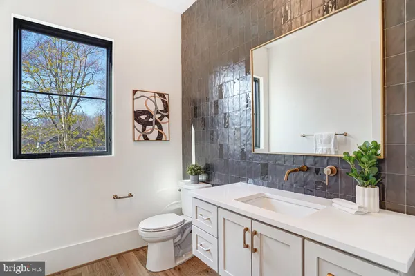 a spacious bedroom with a bed and window