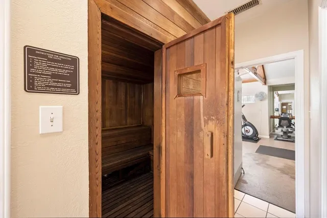 a view of swimming pool with outdoor seating