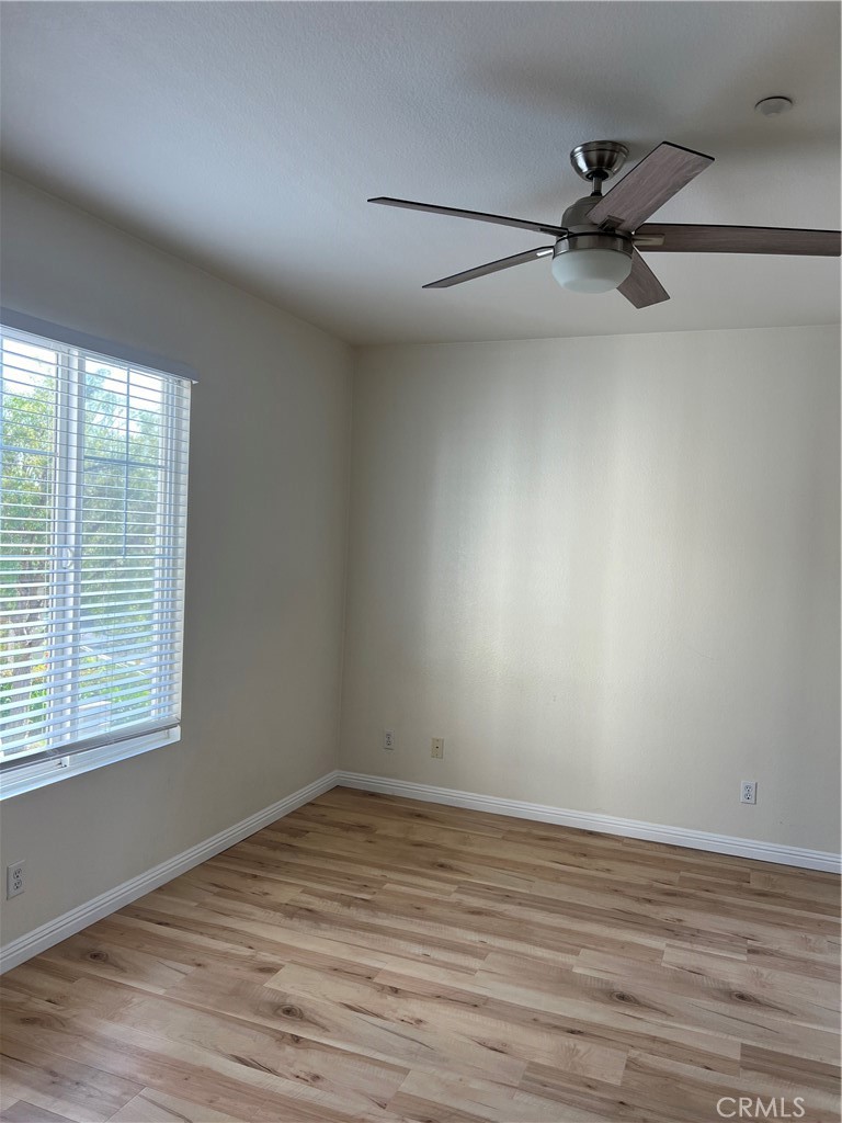 2243 Strickler Drive Fullerton, CA 92833 - Photo 13 of 20 wooden floor in an empty room with a window