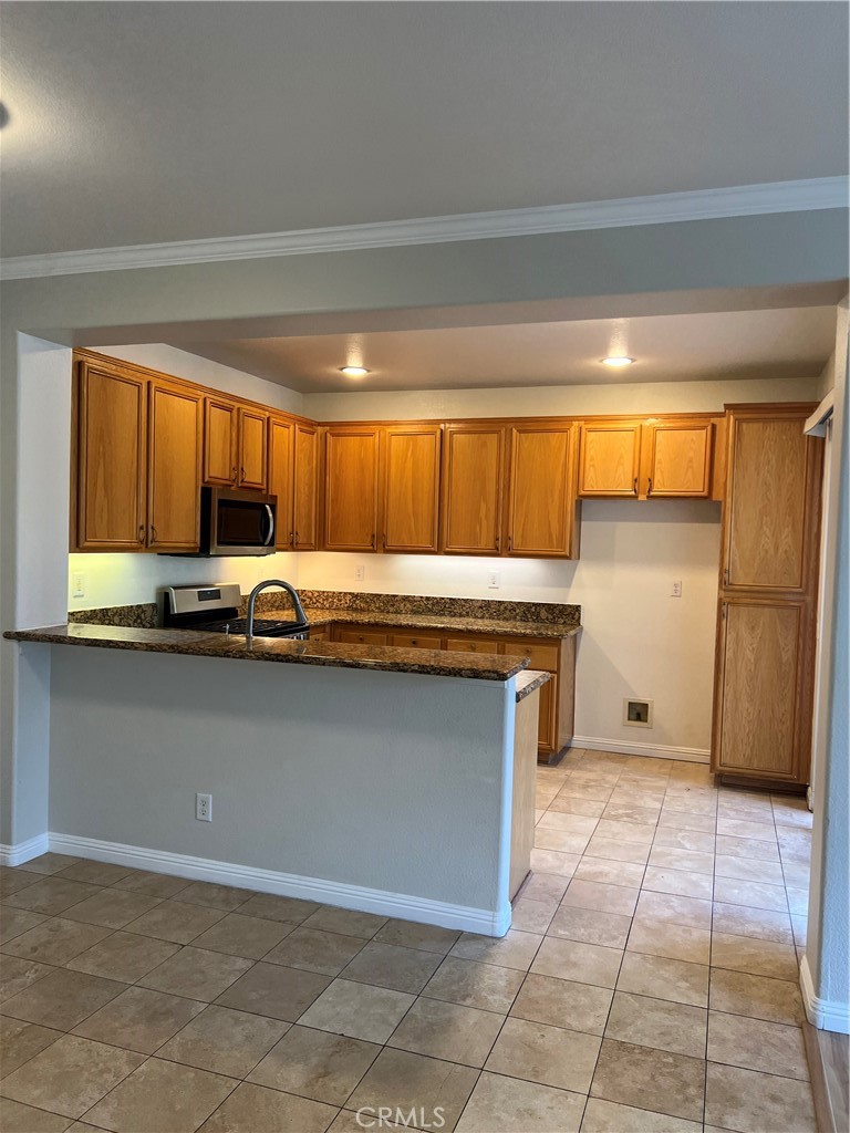 2243 Strickler Drive Fullerton, CA 92833 - Photo 9 of 20 a view of a kitchen with a sink and a dishwasher