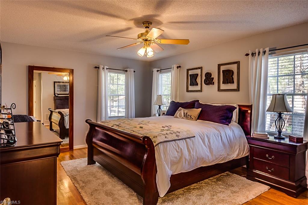 5553 Woodstream Road Randleman, NC 27317 - Photo 15 of 30 Master bedroom with hardwood flooring