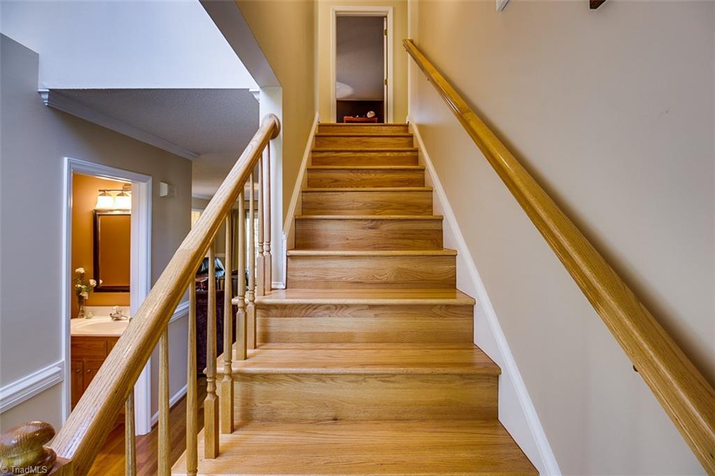 5553 Woodstream Road Randleman, NC 27317 - Photo 18 of 30 Stairway to office and 2 upstairs bedrooms