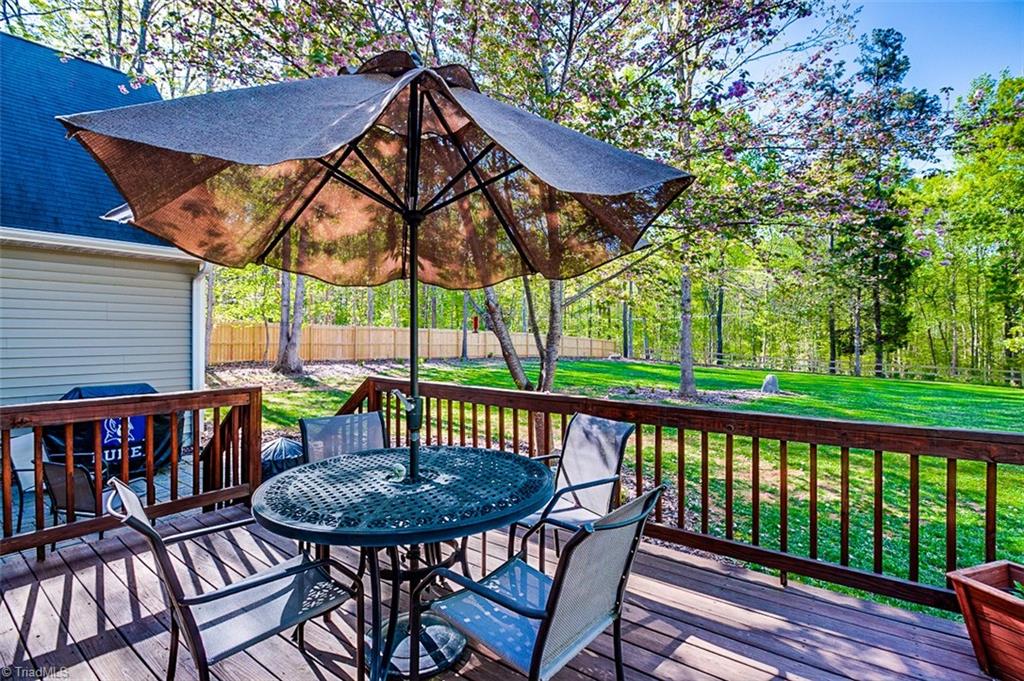 5553 Woodstream Road Randleman, NC 27317 - Photo 27 of 30 Back deck, patio and fenced backyard