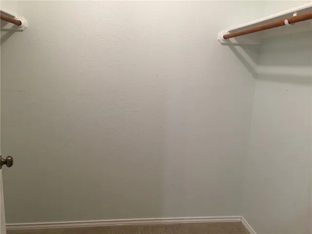 a bathroom with a sink and a window