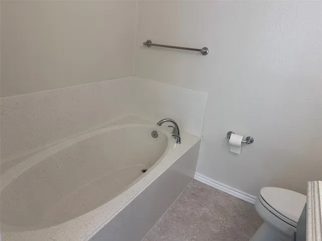 an empty room with a empty space and window