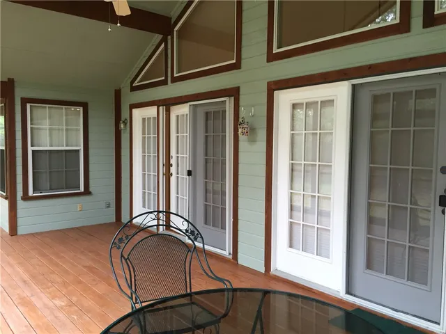 a bathroom with a sink and a large mirror