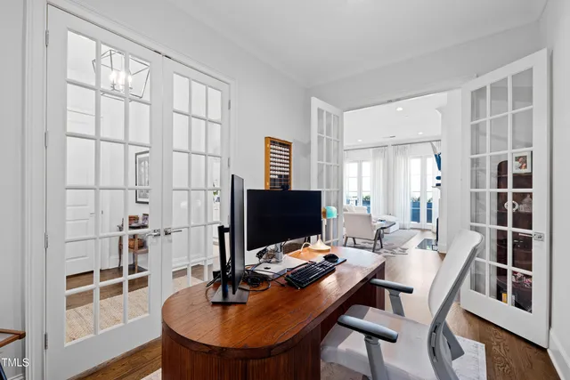 a workspace with furniture and window