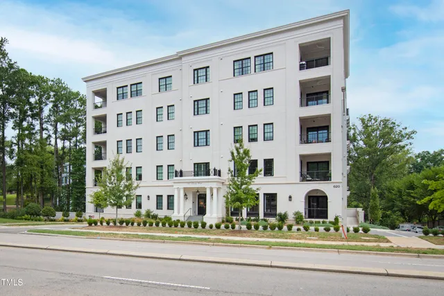 a front view of a multi story building