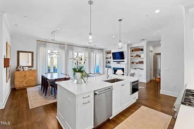 a view of a living room and dining room