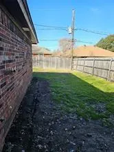 a view of a yard with an outdoor space