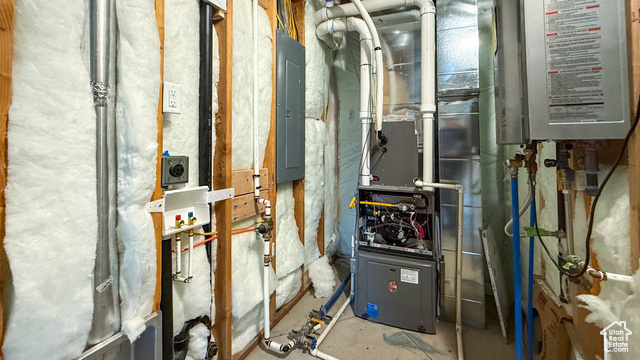 5236 North Holly Way Helper, UT 84526 - Photo 29 of 34 Utilities with heating unit, water heater, and electric panel